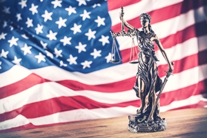 Lady Justice with American Flag Background